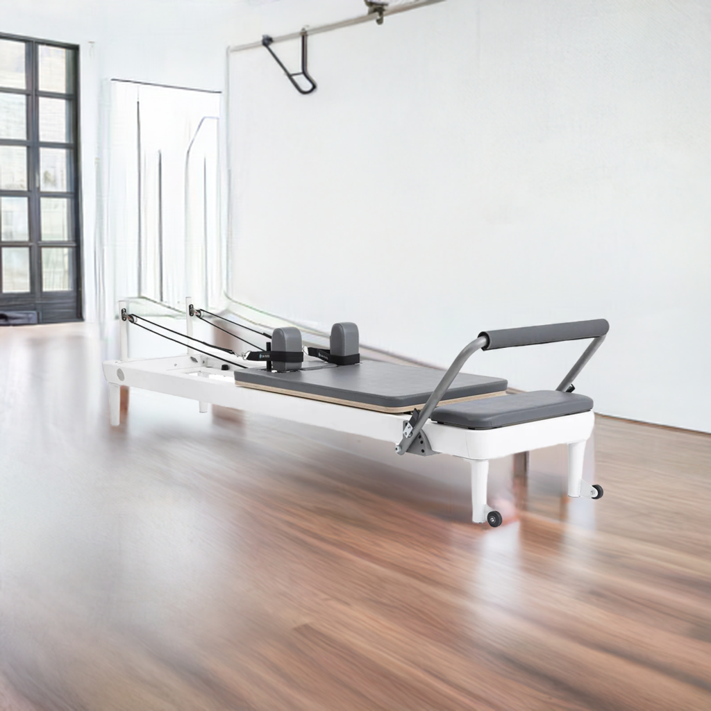 "Elina Pilates Nubium Reformer in grey – a high-performance reformer for home and studio workouts."

